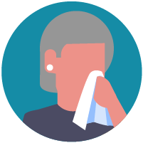 an image of a woman with a tissue to her nose